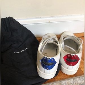 White YSL sneakers with red and blue accents